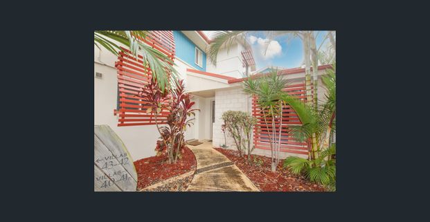 FULLY FURNISHED TOWNHOUSE WITH OCEAN VIEWS - Photo 1