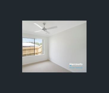 Situated on a corner block in the growing suburb of Park Ridge, thi... - Photo 1