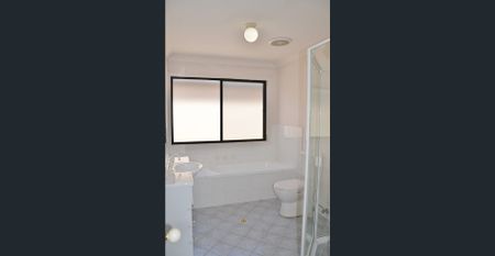 Spacious 4-Bedroom Home in a Convenient Location - Photo 2