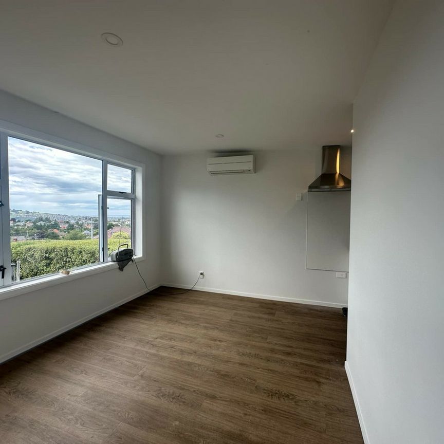 Tastefully renovated in a convenient location - Photo 1