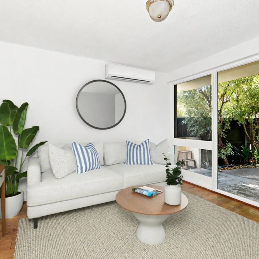 Low-Maintenance Apartment with Stunning Private Courtyard! - Photo 1