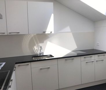 Moderne 3.5 Zimmer-Dachwohnung an Zentrumslage - Photo 6