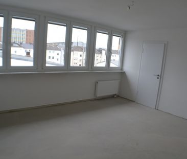 Stadt-Dachgeschosswohnung! - Photo 1