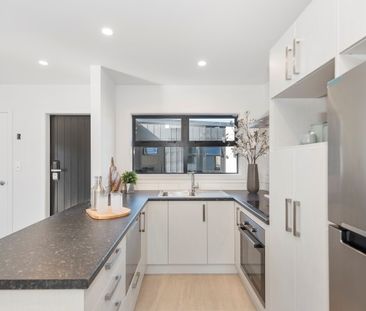 Located on Bruce Avenue, this modern two-bedroom unit offers comfor... - Photo 1