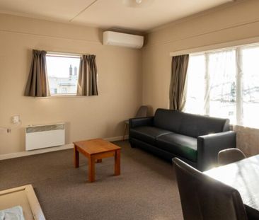 Very tidy, north facing unit and close to town! - Photo 2