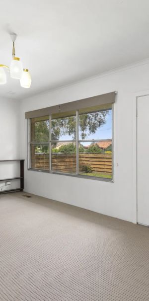 Spacious Three-Bedroom Residence with Expansive Yard - Photo 1