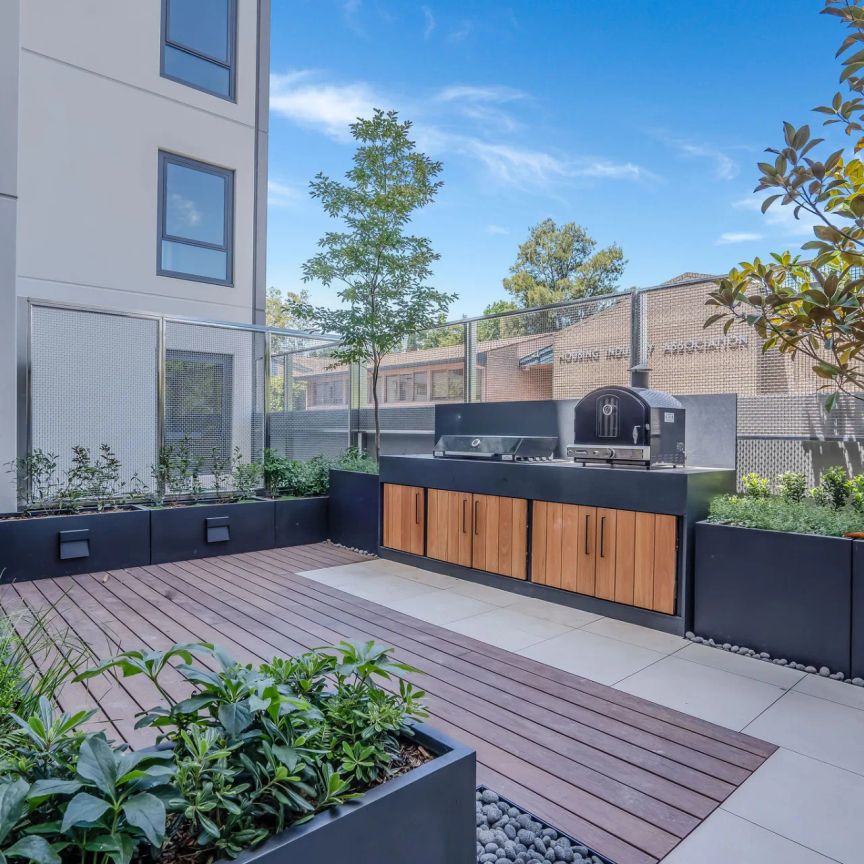 Experience Modern Living at the Prestigious "Seventy One" Complex - Photo 1