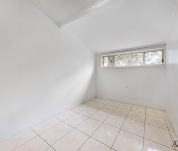 THREE BEDROOM HOUSE WITH SPACIOUS BACKYARD - Photo 1