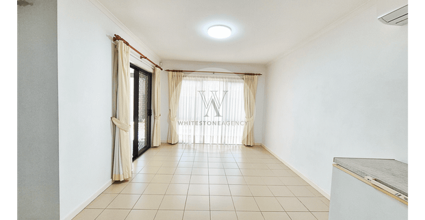 Spacious Double-Storey Home | Central Location - Photo 1