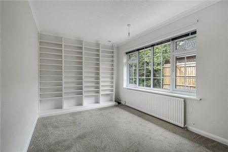 A 3 bedroom detached bungalow with a double garage and ample parking. - Photo 2