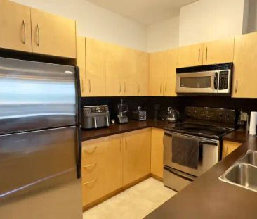 TOP-FLOOR 1+Den BDRM Condo - Springbank Hill | 314 - 69 Springborou... - Photo 1