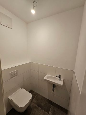 Erstbezug - 2-Zimmer-Wohnung mit Balkon, möblierter Küche, Tiefgaragenstellplatz - Foto 5