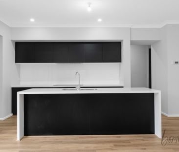 Spacious 4-Bedroom Family Home with Modern Features - Photo 6