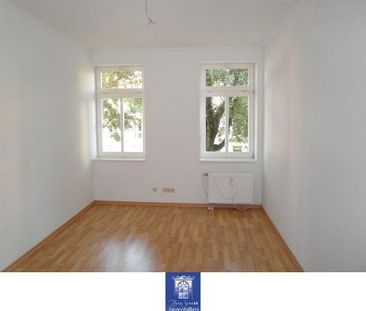 Wunderschöne und großzügige Familienwohnung mit hübschem Balkon! - Foto 1