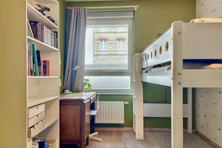 Rez de Chaussée avec jardin - 3 chambres / double parking interne - Photo 5