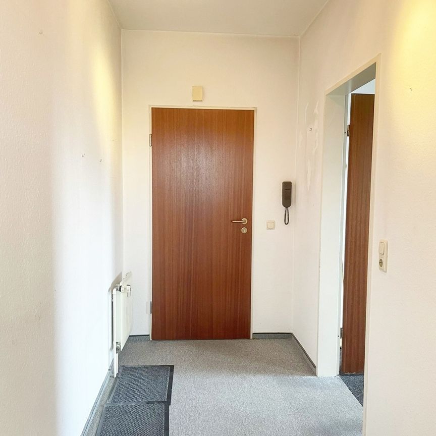 Charmante 2-ZKB Dachgeschosswohnung im Herzen von Friesoythe zu vermieten! - Photo 1