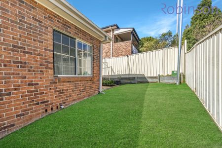 Elevated three bedroom modern home with double garage - Photo 2