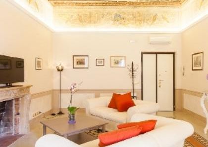Center-Historic Jewish Quarter: Elegant apartment situated in beautiful Palazzo Nobiliare. Entrance, spacious living with original wood frescoed ceilings, large modern dining and kitchen, 4 bedrooms, 4 Baths, small terrace. #1527