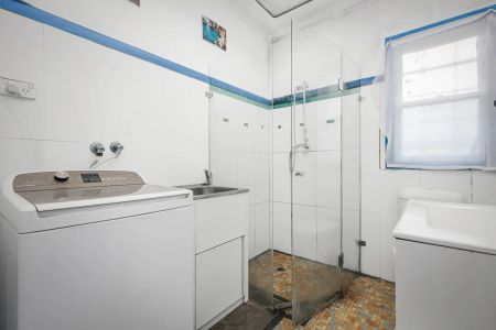 Spacious 3-Bedroom Brick Home on a Large Corner Block - Photo 2