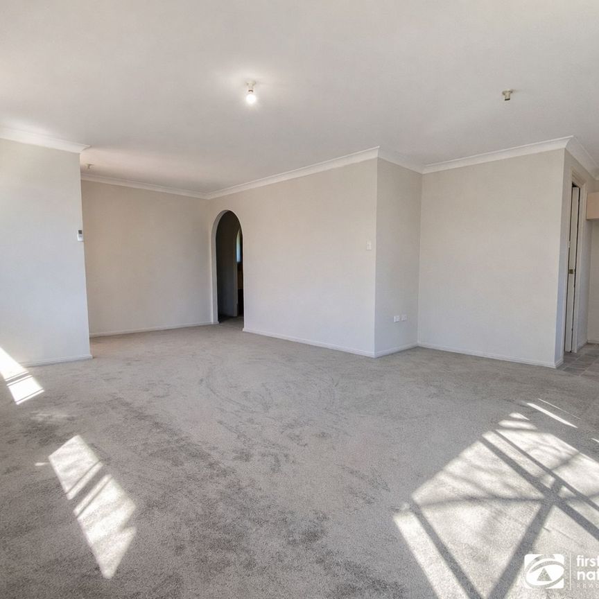 Conveniently Located & Low Maintenance - Photo 1