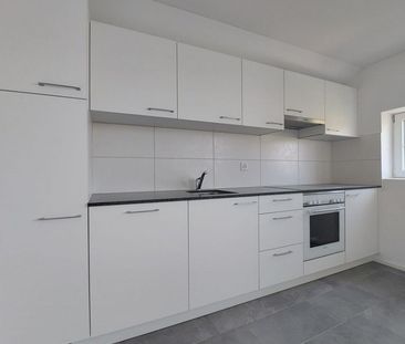 Appartement de 2,5 pièces au 2ème étage avec jardin commun - Photo 3