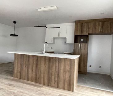 Grands 5½ demi-sous-sol, construction neuve - Photo 2