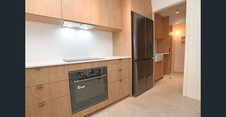 SUPERBLY FULLY RENOVATED FURNISHED TOWNHOUSE IN THE PERFECT LOCATION - Photo 2