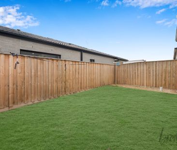 Spacious 4-Bedroom Family Home in Prime Location - Photo 1