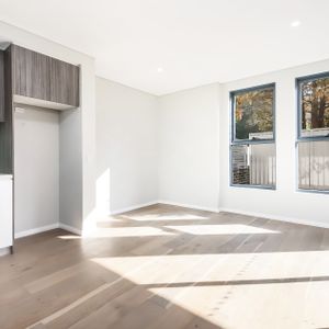 Modern two bedroom unit - 20% below market rent - Photo 2