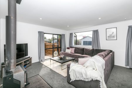 This beautifully refreshed four-bedroom, single-bathroom home offers modern living in a prime Nawton location. - Photo 5