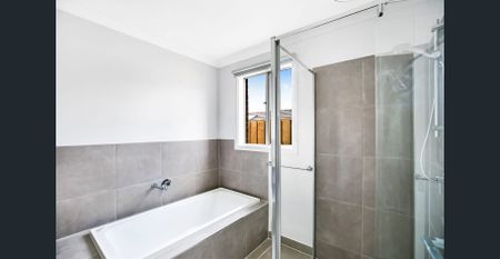 This brand-new, contemporary three-bedroom home - Photo 2