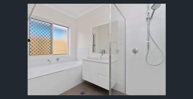 4 BEDROOM HOME WITH OPEN PLAN KITCHEN LIVING THAT OPENS OUT ONTO AN ALFRESCO DINING AREA. AIR CON IN THE MASTER BEDROOM. SECURITY SCREENS ON WINDOWS. - Photo 1