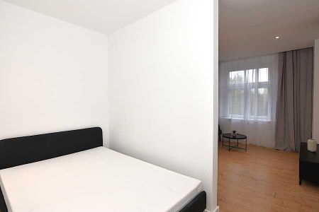 Nowocześnie odnowiona kawalerka w Centrum - Фото 4