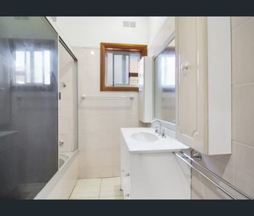 Charming Port Kembla Home with Spacious Living and Expansive Yard - Photo 1