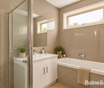 Spacious Three-Bedroom Home with Multiple Living Areas - Photo 6