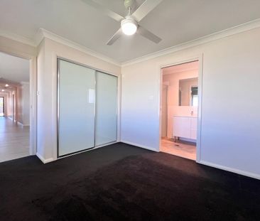 NEAR NEW 4 BEDROOM HOME - Photo 4