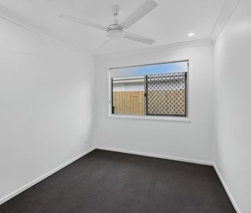 Brand New 4-Bedroom Home | Ducted Air, Solar & Multiple Living Areas - Photo 6