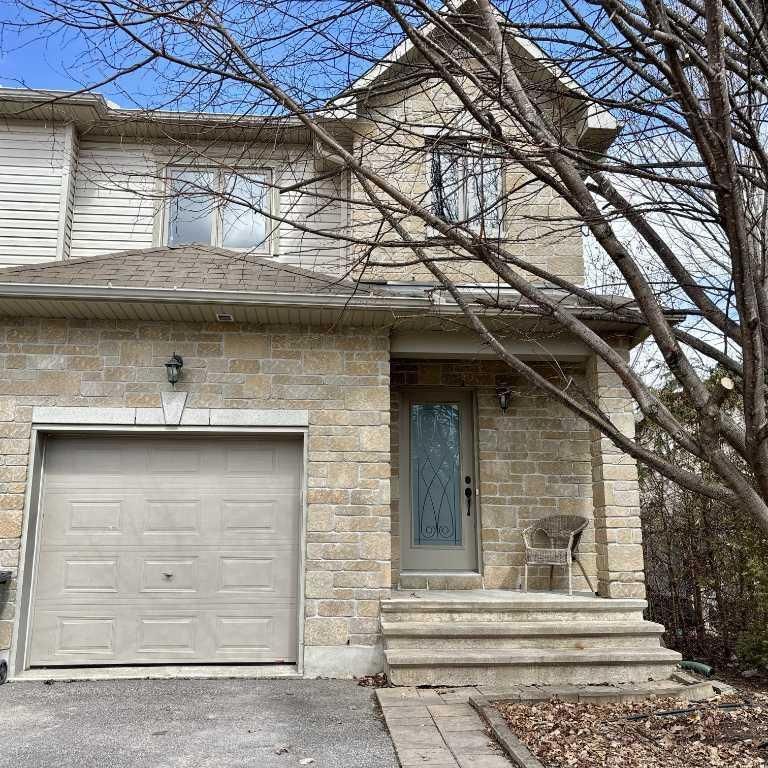 MODERN END-UNIT TOWNHOUSE with Finished Basement and Parking - Photo 1