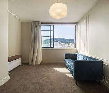 Welcome to 102 at Chevron Suites - Photo 1