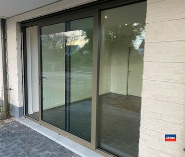 Gelijkvloersappartement met 1 slaapkamer, tuin en autostaanplaats -... - Foto 2