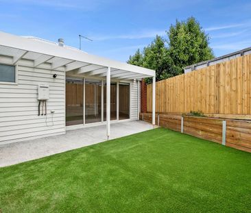 Modern Two-Bedroom Home in a Convenient Location - Photo 3