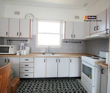 TOP FLOOR TWO BEDROOM APARTMENT WITH WATER VIEWS! - Photo 3