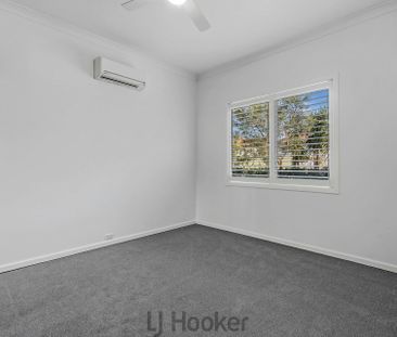 FRESHLY UPDATED HOME IN SOUGHT AFTER LOCATION! - Photo 4