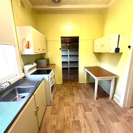 Available NOW - Quaint 4-bedroom solid brick home - Photo 3