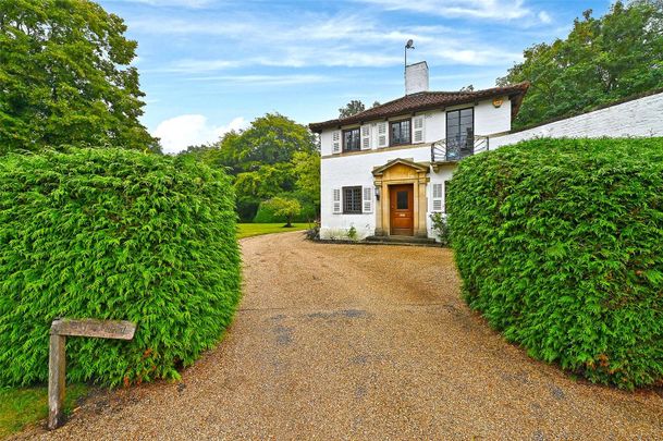 Situated in one of the most sought after roads in Englefield Green, a detached house full of character set in magnificent gardens with swimming pool. - Photo 1