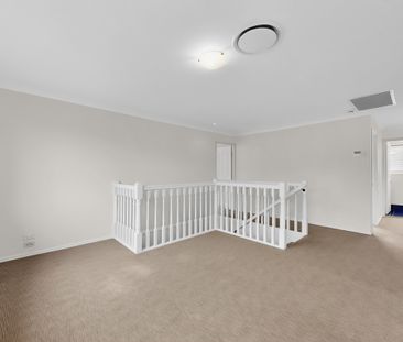 Spacious 5-Bedroom Family Home with Ducted Air and Media Room - Photo 4