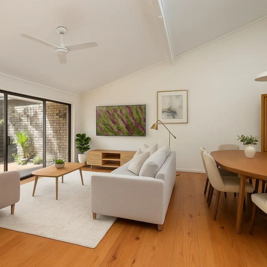 Sunlit Split-Level Townhouse Offering Space, Style & Convenience - Photo 1