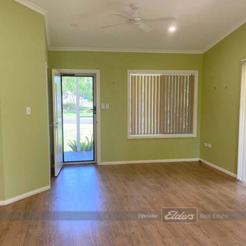 THREE BEDROOM HOME IN TRANQUIL GREEN POINT - Photo 1