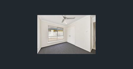 Stylish Lowset Brick Home - Photo 4