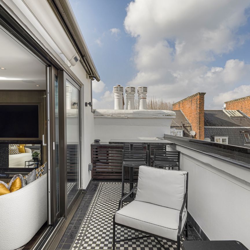 Exquisite three-bedroom duplex penthouse in Kensington - Photo 1